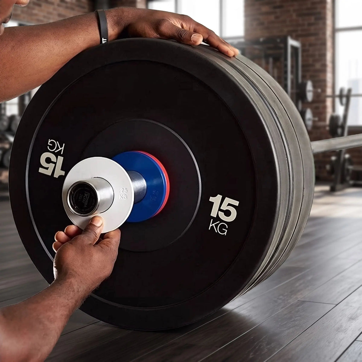 disques musculation montés sur une barre