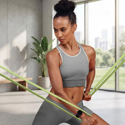 femme exercice hanche avec elastiques musculation