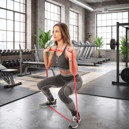femme-exercice-squat-avec-elastique-musculation