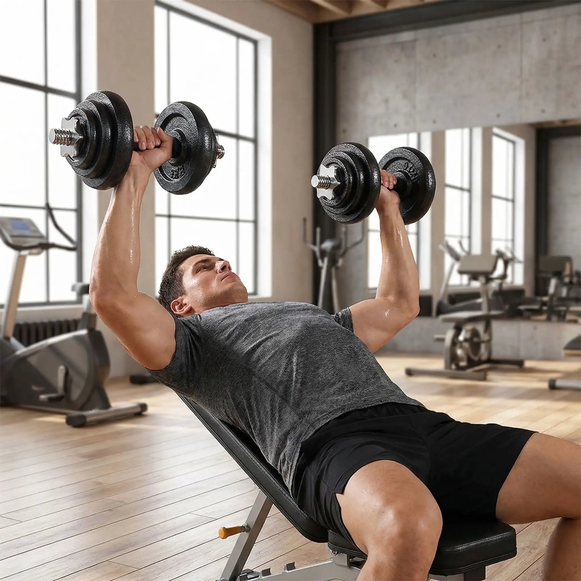 homme exercice pectoraux avec haltères